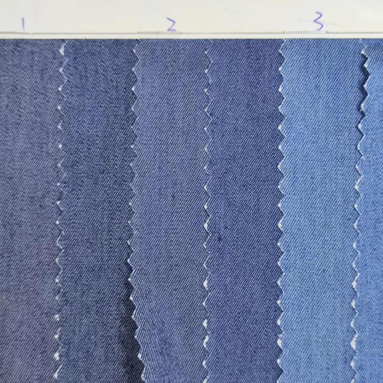 32 100D stretch Denim fabric 150g plain polyester cotton stretch skirt denim factory wholesale 6577