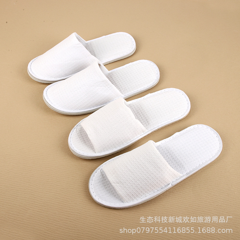 Picture of Hotel and homestay disposable waffle slippers home hospitality travel thickened slippers can be wholesale ordered LOGO