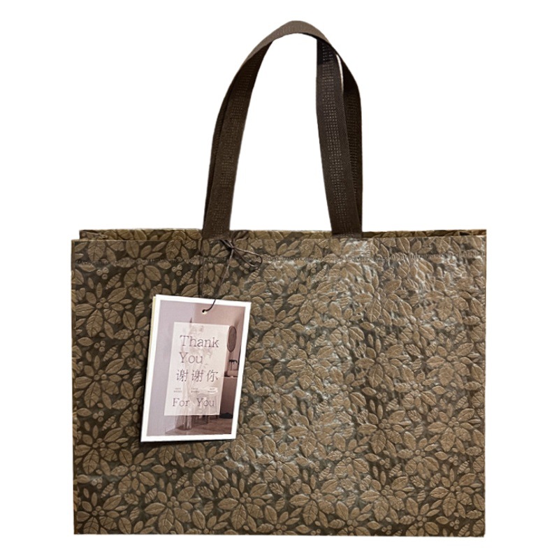 Thickened non-woven bag shopping bag environmental protection bag high-grade three-dimensional pattern flannel bag set women's clothing store handbag wholesale