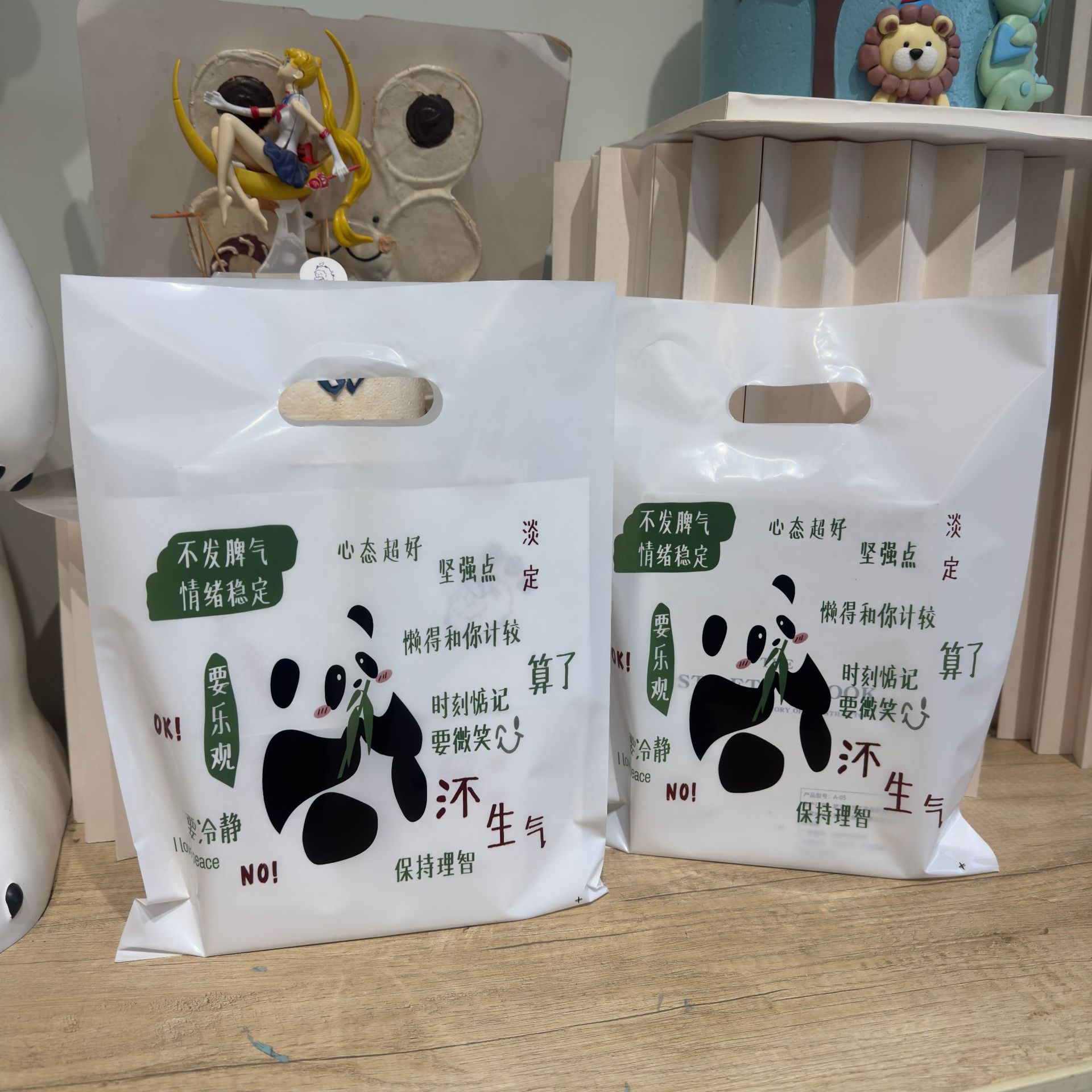 Small jewelry jewelry four-finger bag plastic bag hand bag wholesale mall shopping underwear bag book bag