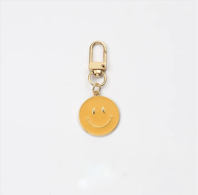 Picture of Cross-border e-commerce alloy color dripping smiley face keychain electroplated gold irregular expression bag pendant accessories