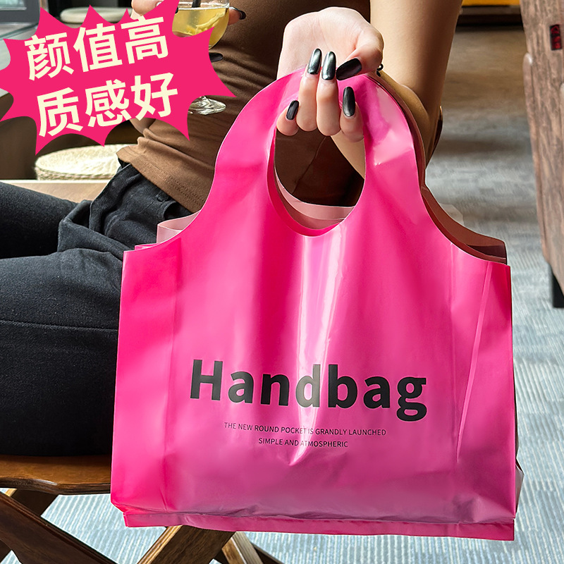 High-end clothing store handbag English printing shopping bag packaging bag fashion plastic bag women's commercial packaging bag