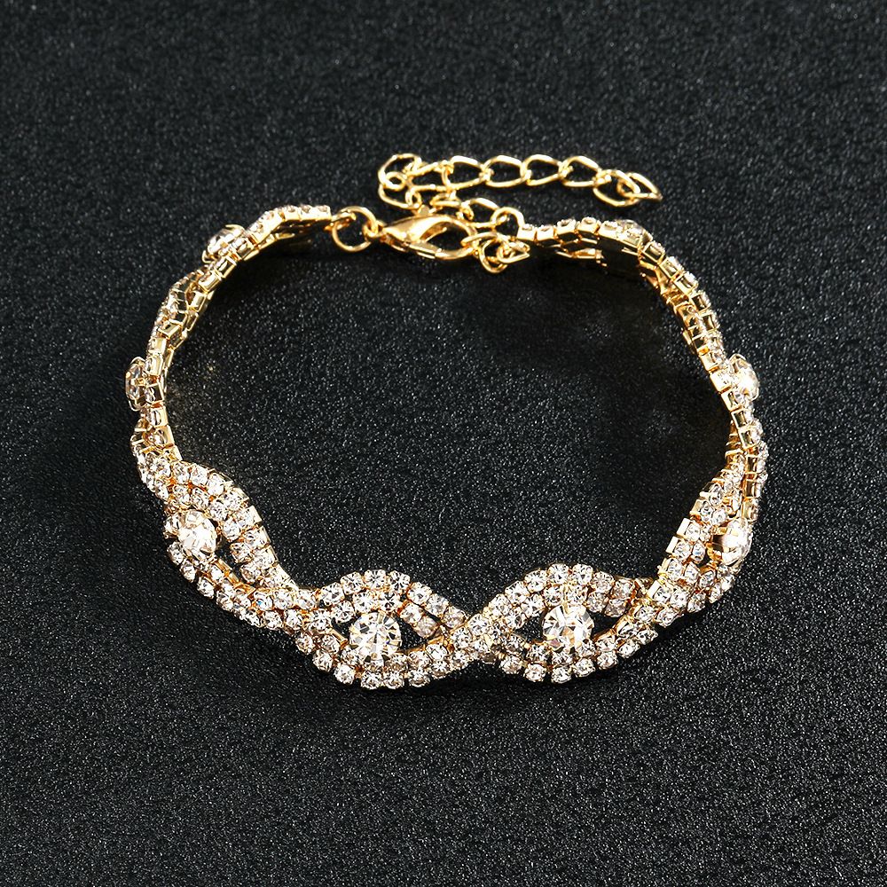 Picture of European and American Fashion Copper Flower Rhinestone Necklace Earrings Bracelet Evening Bag Party Jewelry All-match Bride Four-suit