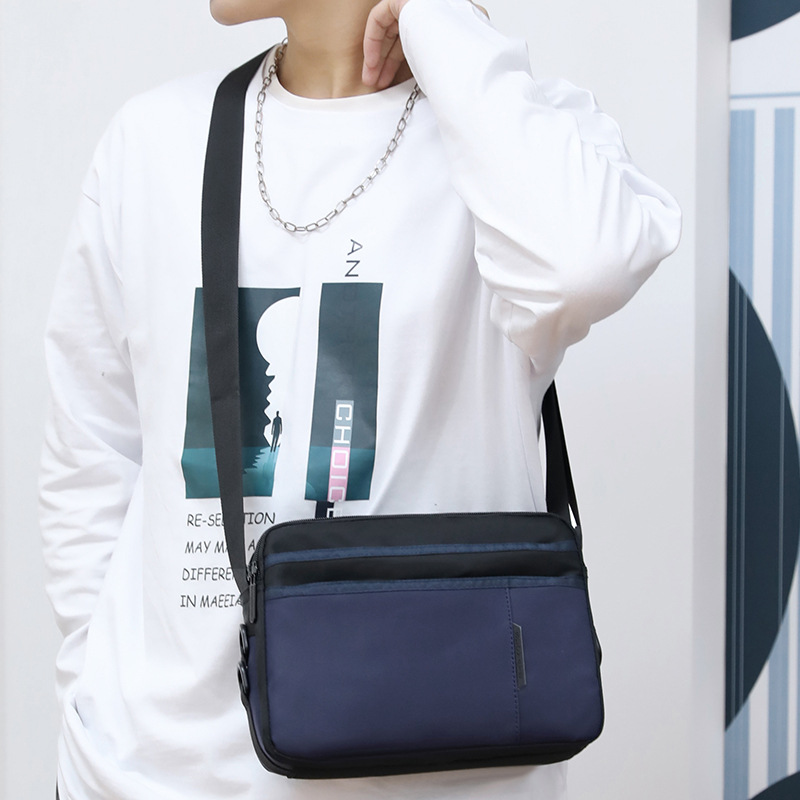 Picture of 2025 New Fashion Contrast Color Shoulder Bag Men's Oxford Cloth Messenger Bag Horizontal Business Casual Bag Travel Backpack Trendy