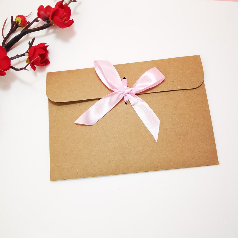 Picture of European envelope Kraft paper style vintage greeting card blessing card packaging bag creative bow CD bag wholesale