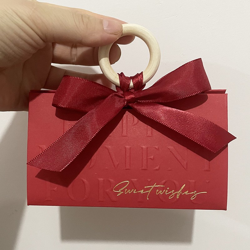 Picture of Light luxury champagne hand-held triangle wedding candy box wooden ring hand gift box wedding candy box wholesale