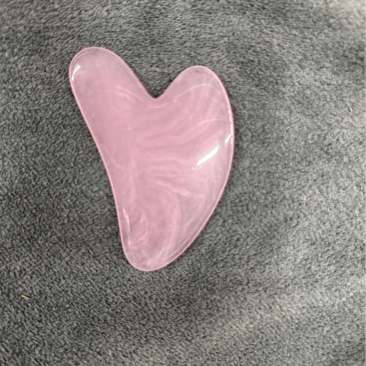 Picture of Manufacturer's Wholesale Resin Heart-Shaped Gua Sha Tools for Massaging the Back, Neck, Waist, and Full Body Meridians, Made of Natural Materials