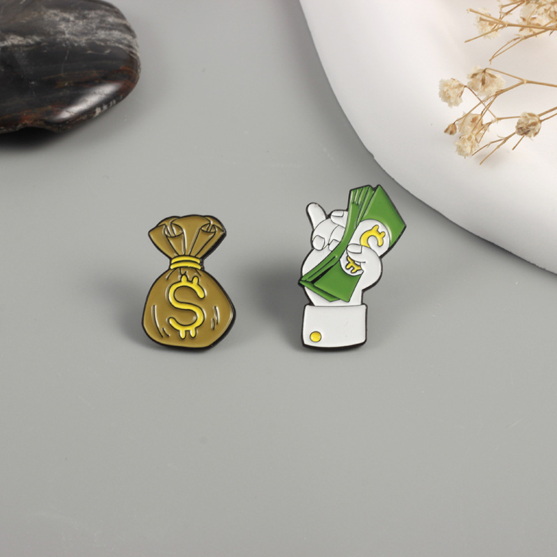 Picture of Put dollars into the bag cartoon fashion badge Flying Dollar full bag dollar creative design brooch