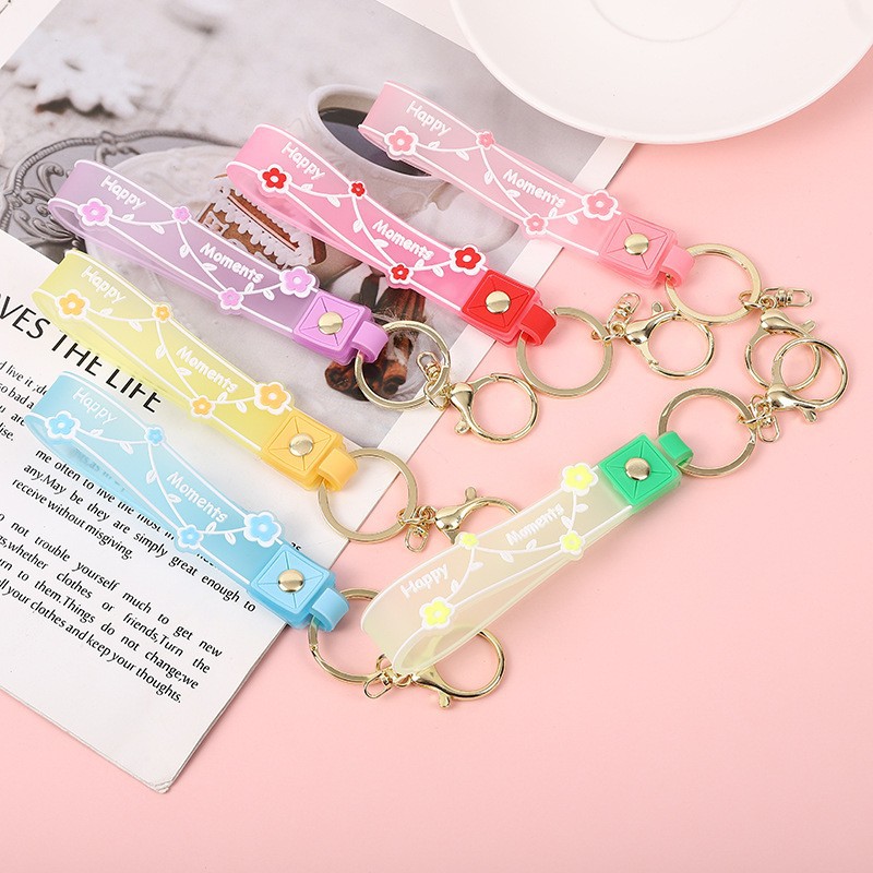 Picture of Transparent candy color soft rubber leather rope keychain small fresh flower creative small accessories cute women's exquisite hand strap