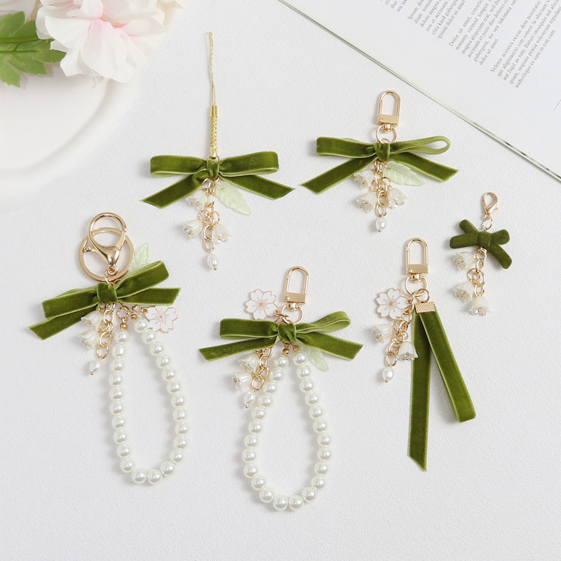 Autumn and winter velvet ribbon Lily-in-the-valley orchid key chain small fresh green ribbon flower pearl chain mobile phone case lanyard