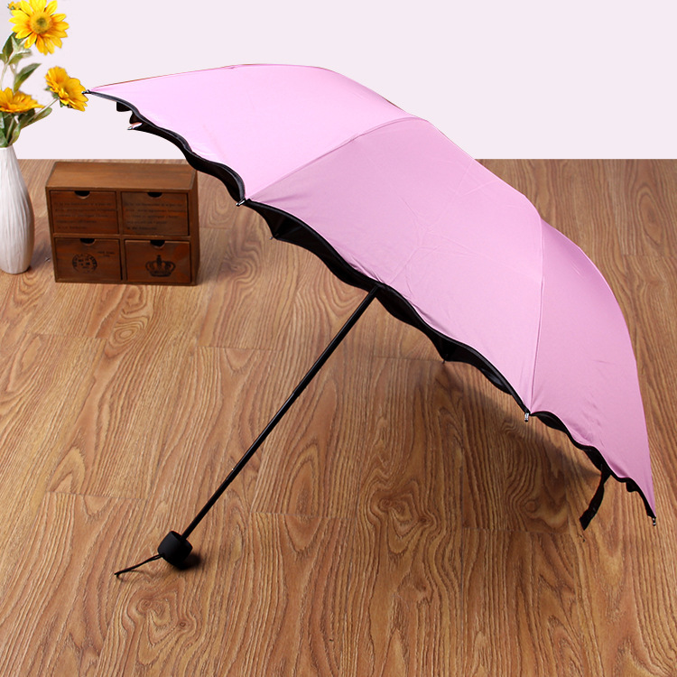 Picture of Factory wholesale creative three folding vinyl water flowering umbrella gift advertising umbrella umbrella can do LOGO