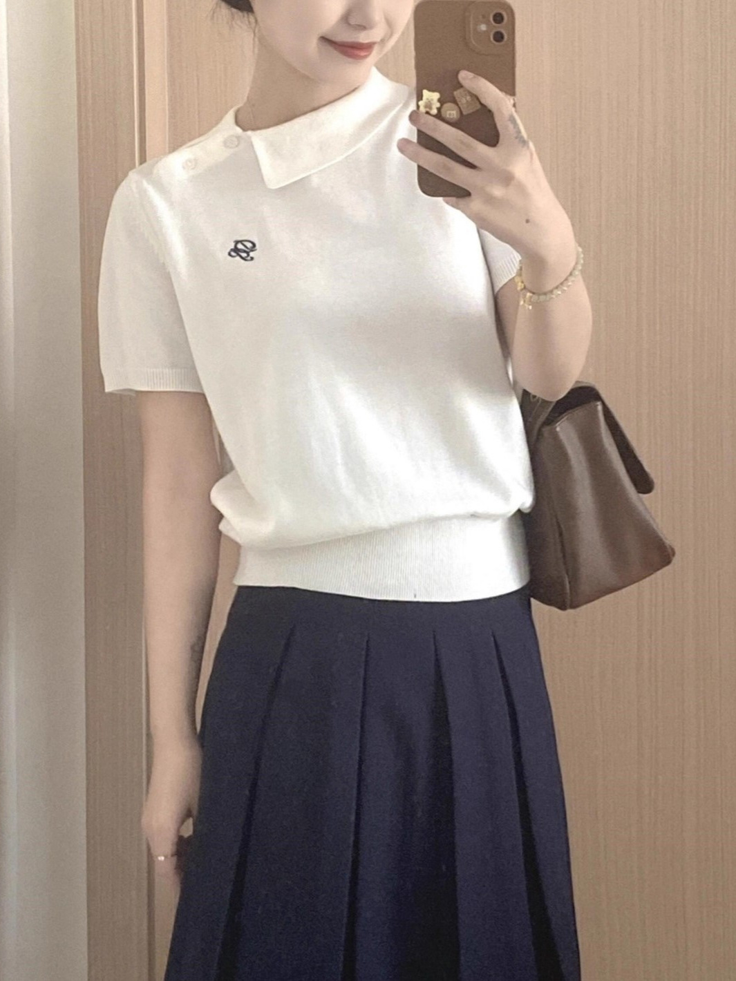 Korean white knitted short-sleeved polo shirt T-shirt women's summer unique and beautiful design short top
