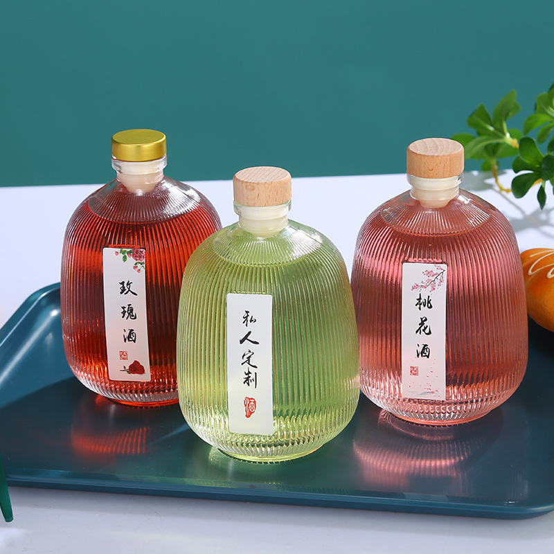 Picture of Hot sale crystal white round vertical bar glass fruit wine bottle packaging glass fruit wine bottle homemade wine bottle wholesale