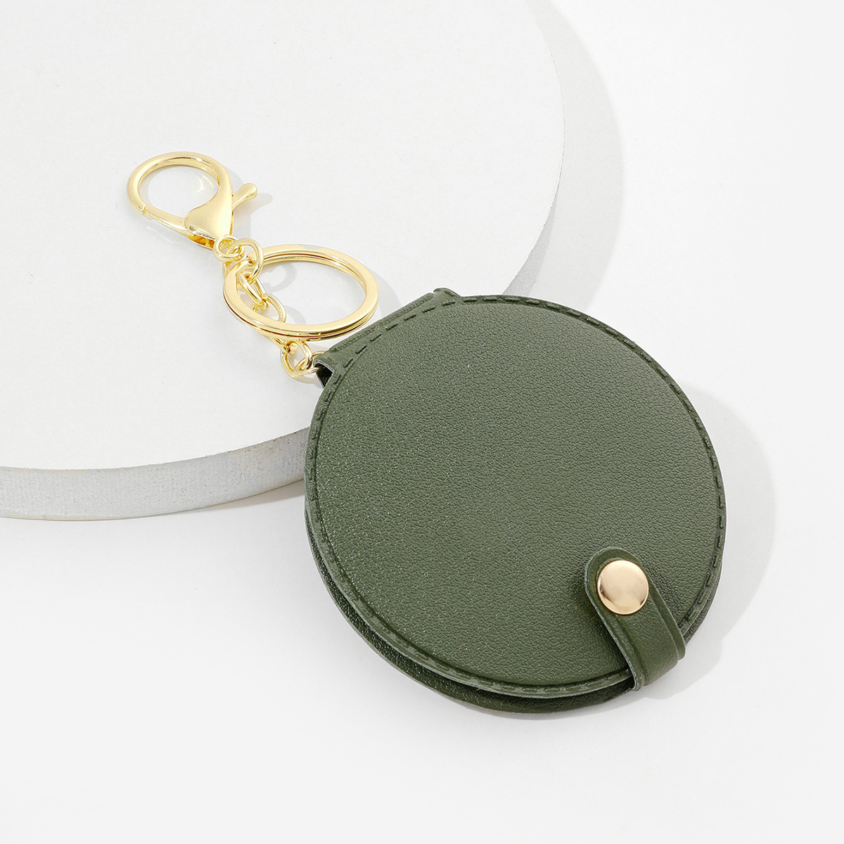 Picture of Creative round makeup mirror keychain pu leather car bag pendant carry-on solid color mini small mirror