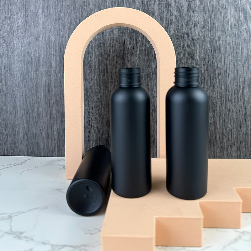 Factory Direct Sales 100ml Sandblasting Round Shoulder Bottle Daily Travel Refill Shower Gel Shampoo Bottle Black Frosted pet
