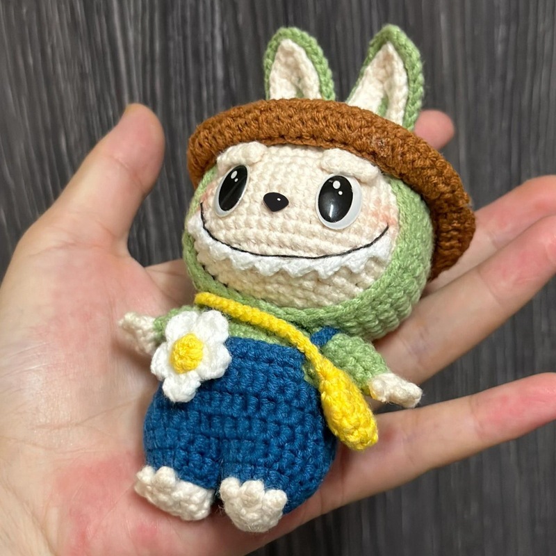 Picture of Couple bag pendant handmade wool knitting DIY filibuster cloth enamel face doll keychain material bag DIY