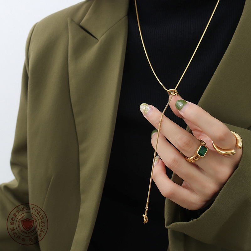 Picture of Korean-style geometric design heart-shaped knotted tassel adjustable sweater chain niche 18K gold plated necklace jewelry M045