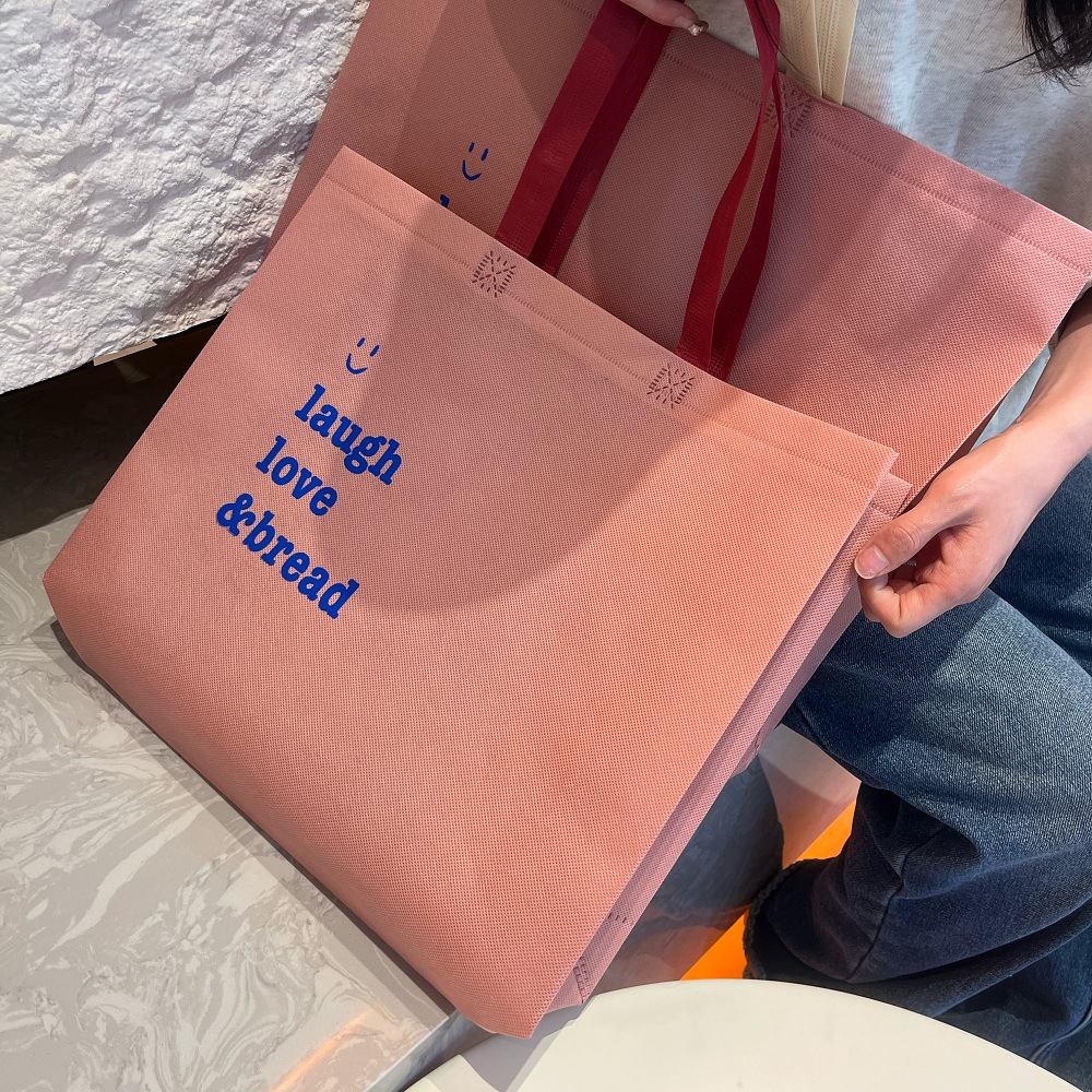 Promotional non-woven handbag non-laminated packaging clothing store logo children's clothing store shoe bag shopping bag packaging
