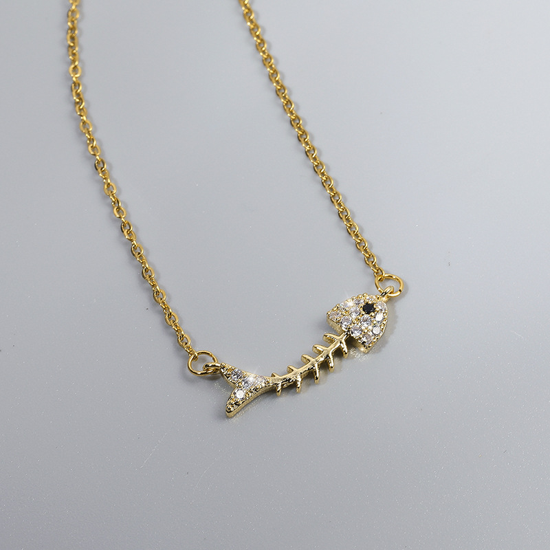 Picture of High-grade exquisite micro-inlaid fish bone necklace women's clavicle chain short gold personality pendant titanium steel furnace real gold