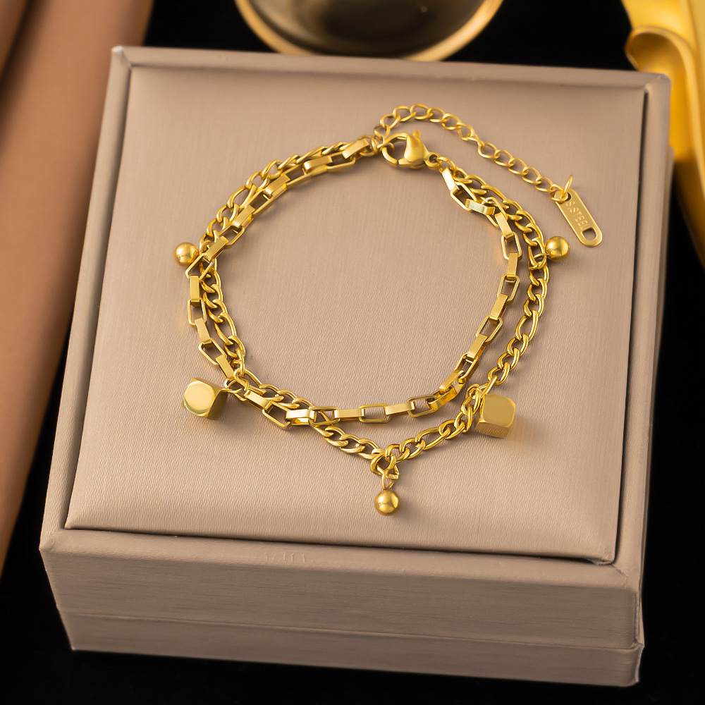 Cross-border explosions European and American fashion retro simple high-end sense double-layer eight directions to money transfer beads titanium steel bracelet wholesale