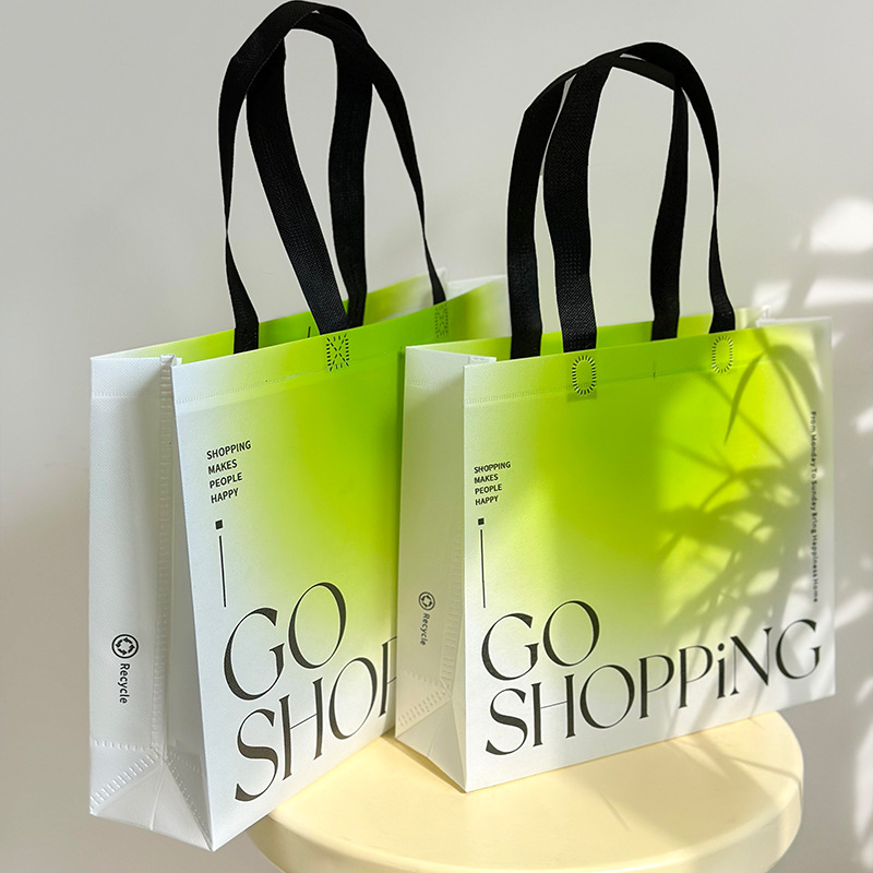 Green gradient English film coated non-woven bag shopping bag custom wholesale clothing store packaging handbag gift bag