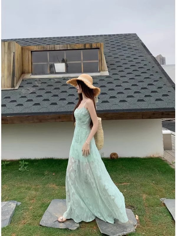 Picture of 2025 Summer New French Style Fresh Sweet Sling dress Women's Seaside Vacation Wear Mid-Length Skirt with Tight Waist