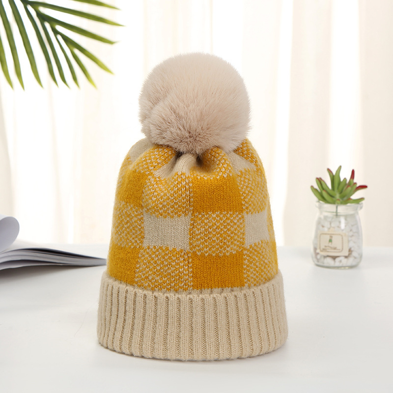 Picture of Korean Style Women's Autumn and Winter Warm Hat with Artistic Plaid Design, Rabbit Fur Pom-Pom, Fashionable Knitted Hat with Artistic Flair