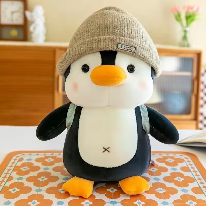 Picture of Backpack travel penguin doll plush toy grab doll doll children's day female birthday gift items wholesale