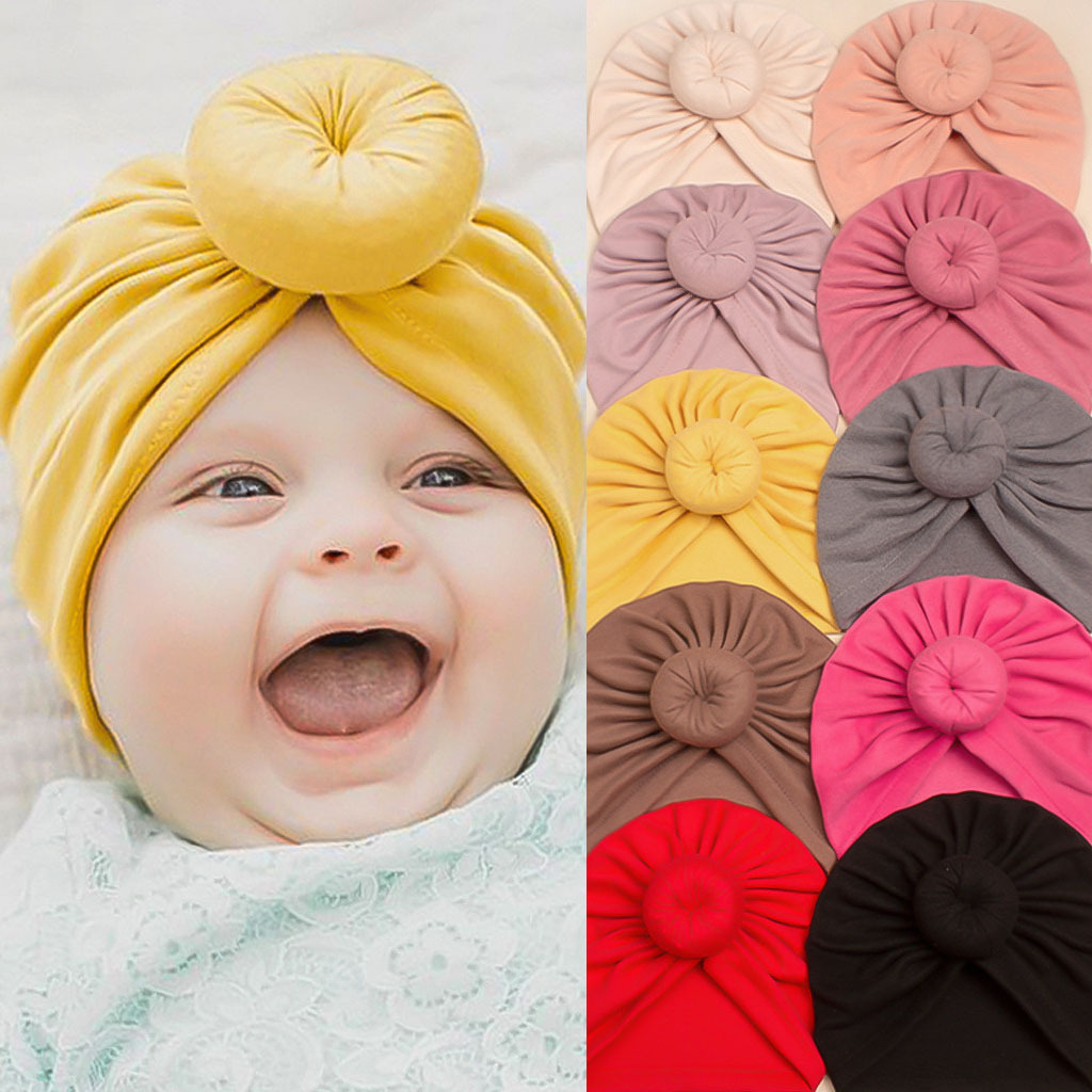 European and American winter warm plain children's pullover hat baby soft and comfortable donut headscarf hat baby hat