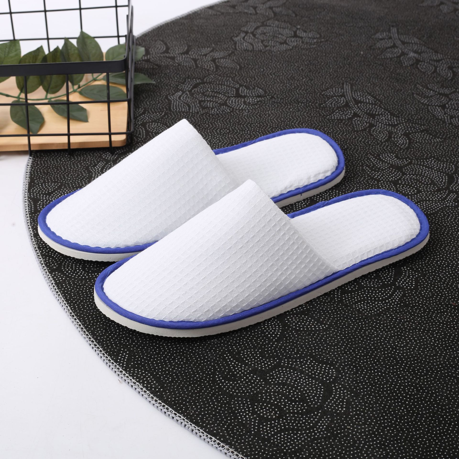 Picture of Hotel and homestay disposable waffle slippers home hospitality travel thickened slippers can be wholesale ordered LOGO