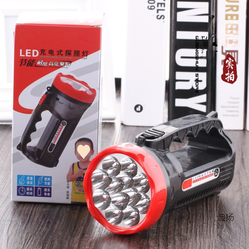 Charging flashlight, outdoor strong light searchlight, hand holding emergency lamp, elderly plastic flashlight wholesale
