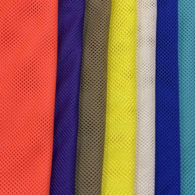 Spot supply of 75D polyester low elastic small four corner mesh cloth sportswear school uniform lining cloth bags shoes and hats mesh cloth