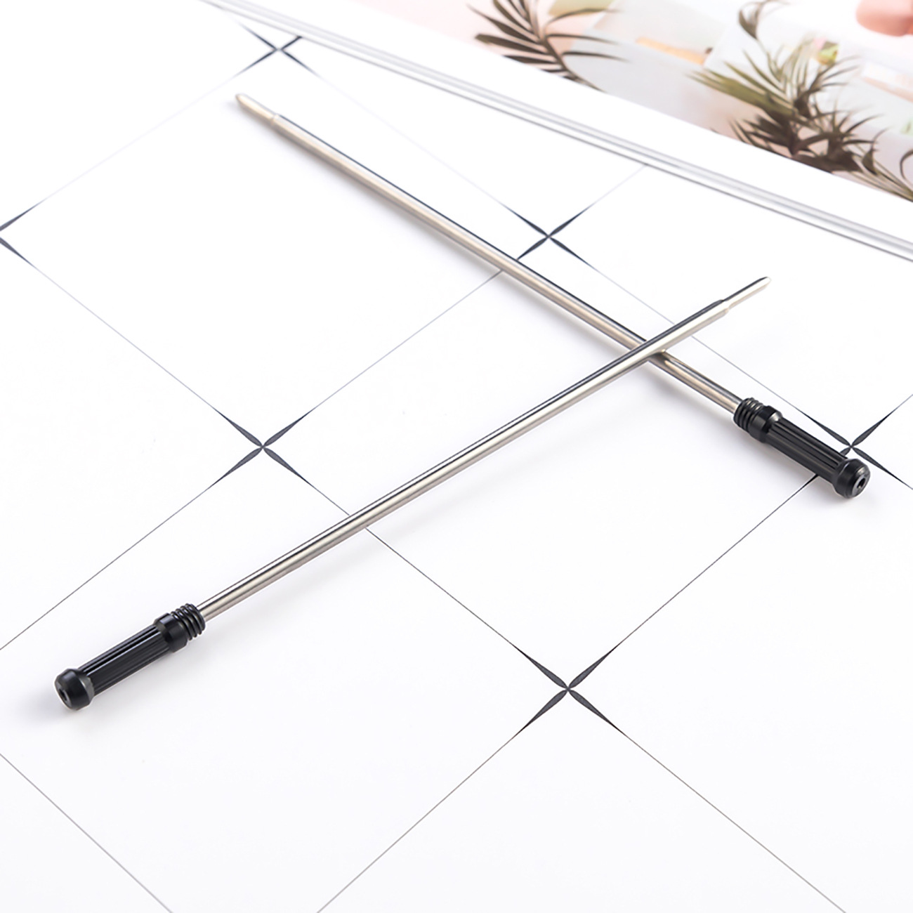 Picture of New Spot Small Gao Shibi Metal Refill Student Stationery Ballpoint Pen Refill Small Crown Pen Refill
