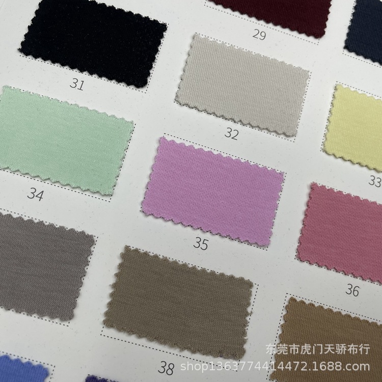 In stock cotton polyester air layer fabric 260g cotton polyester jelly air layer casual clothing dress children's clothing material