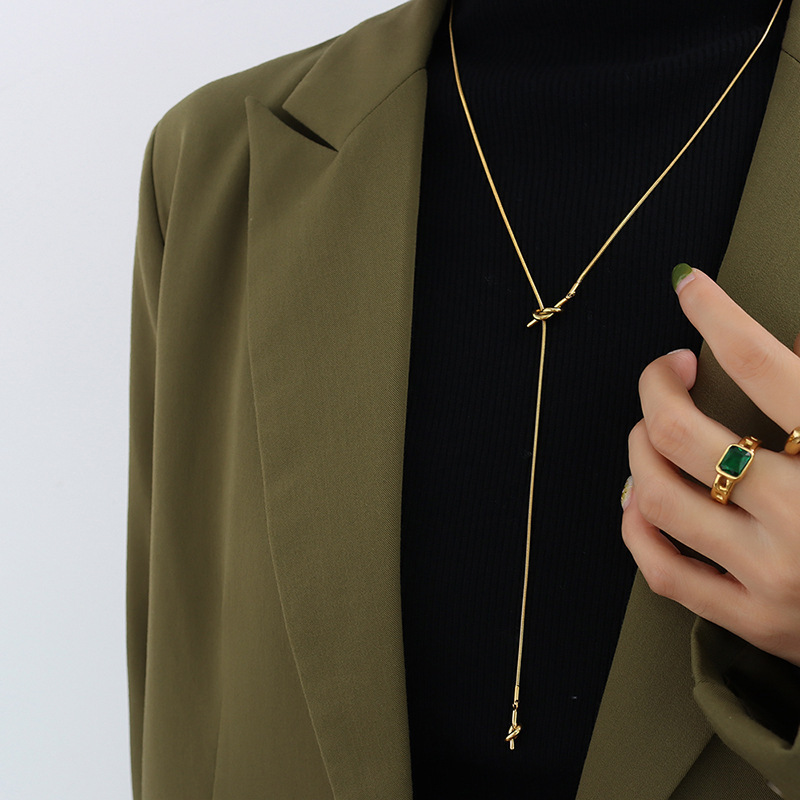 Picture of Korean-style geometric design heart-shaped knotted tassel adjustable sweater chain niche 18K gold plated necklace jewelry M045