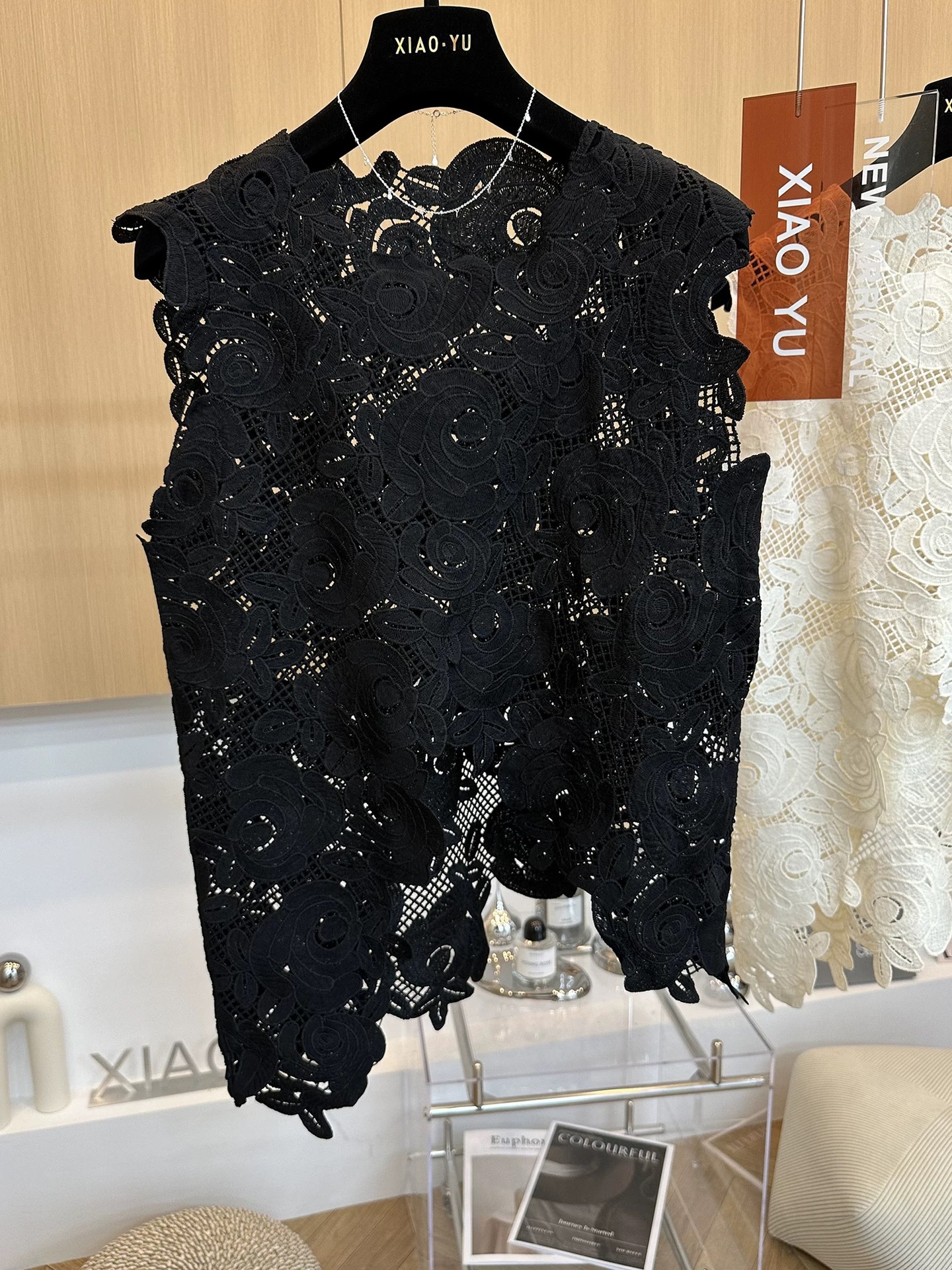 Picture of High-end European summer new unique hook flower hollow irregular hem sleeveless vest lace shirt girl