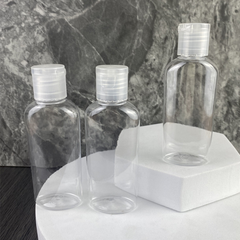 20 teeth 60ml flat round bottle round shoulder PET colorless transparent hand sanitizer bottle disinfectant alcohol sample to carry with you