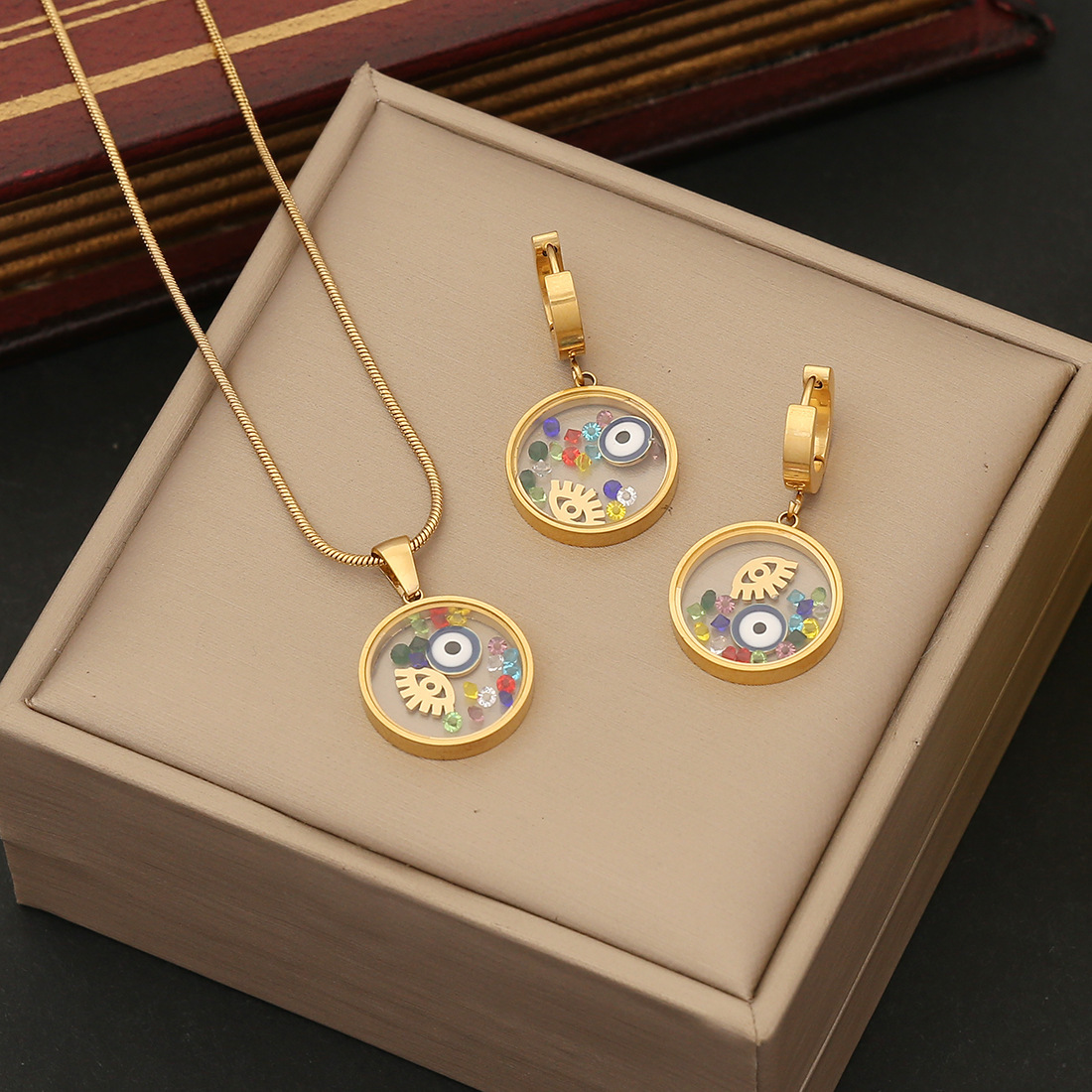 A set of dripping eyes necklace earrings set five flower glass hollow pendant European and American cross-border new jewelry women