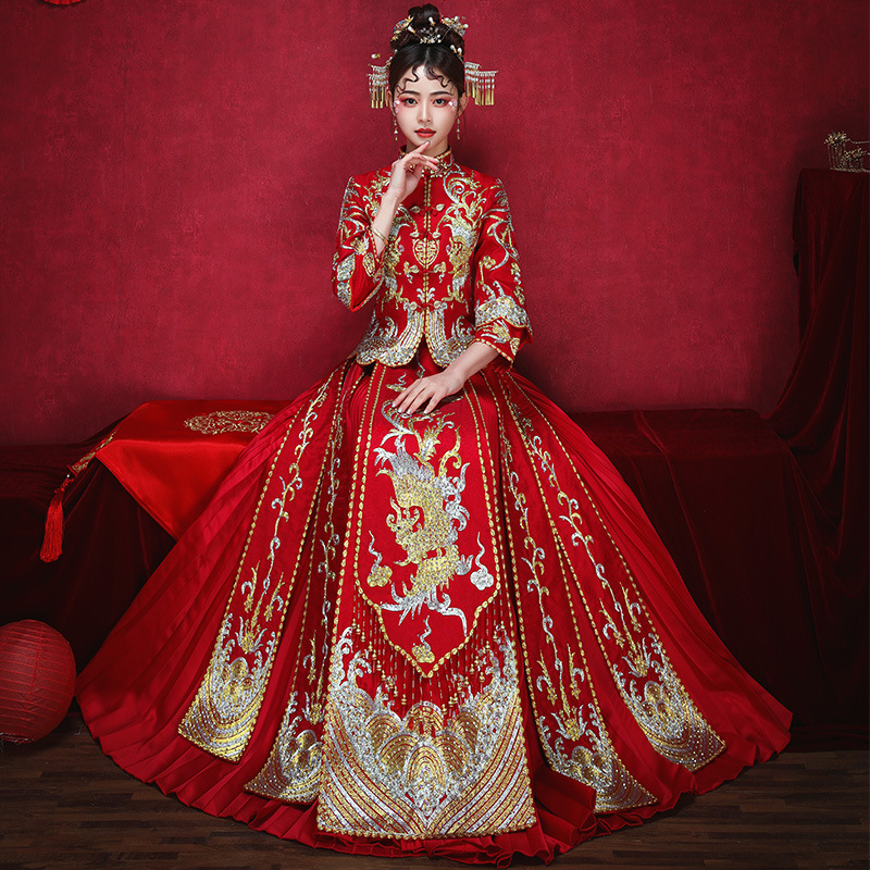 Xiuhe clothing xindeqi 22 spring new women's embroidered satin Golden Jade tassel large swing improved live banquet
