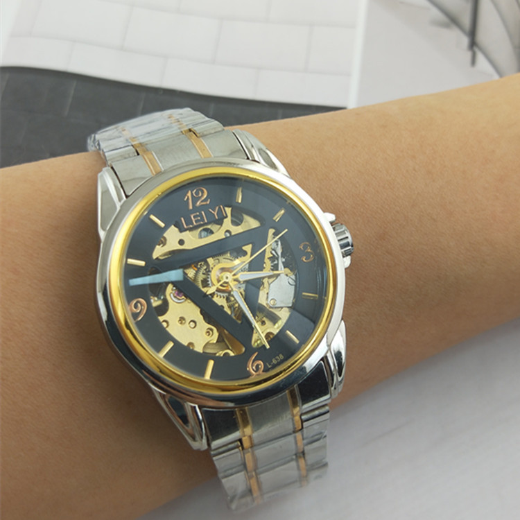 Steel band Men's Watch hollow mechanical movement watch Roman letter blue needle gold stainless steel men's watch wholesale