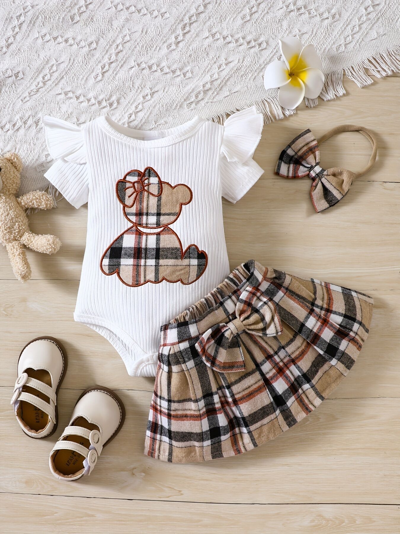 Picture of Cross-border INS newborn baby bag fart triangle khayi baby girl plaid skirt summer bear two-piece suit