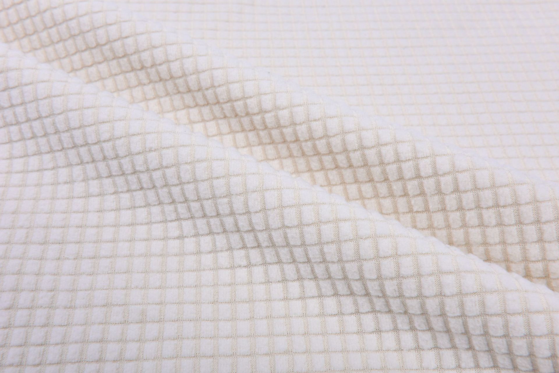 Picture of in stock pineapple plaid fleece sofa cover fabric wholesale waffle corn grain plaid jacquard flannel fabric