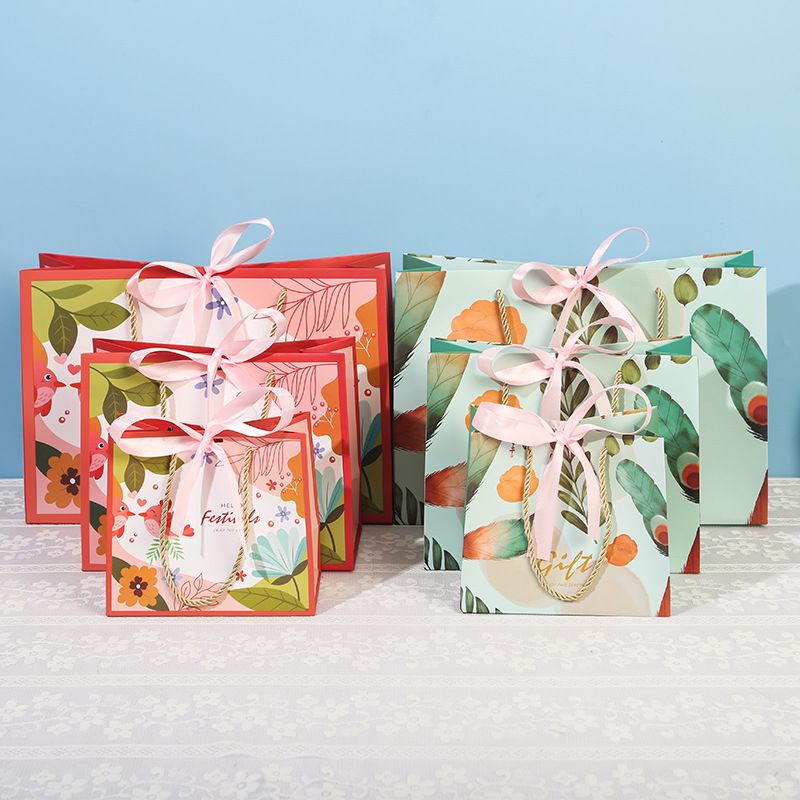 Spring ceremony gift bag bird language and flower fragrance high-grade hand gift bag bow handbag paper bag