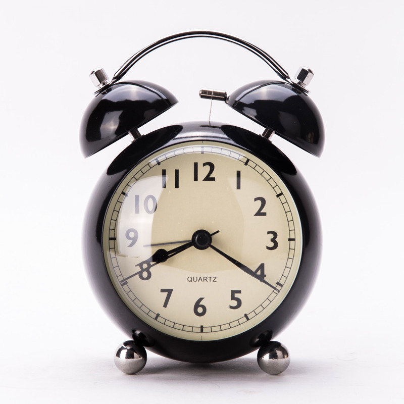 Picture of European-style retro pointer desk clock metal creative bell alarm clock desktop mute student night light quartz desk clock