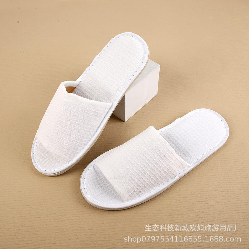 Picture of Hotel and homestay disposable waffle slippers home hospitality travel thickened slippers can be wholesale ordered LOGO