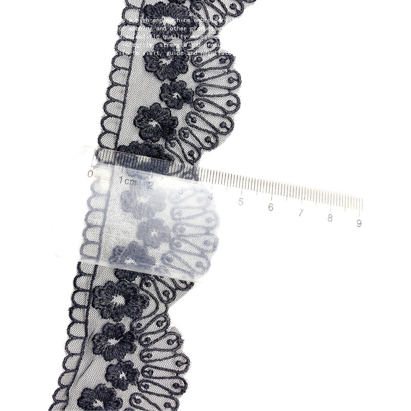 The height of the dense net flower is 4.5CM. The single side wave net yarn is cut by hand. The water soluble lace embroidered with small bar code lace