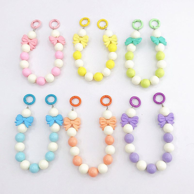 Picture of New Candy Color Acrylic Hand Chain Colorful Bow Bag Pendant Diy Mobile Phone Case Accessories Trend