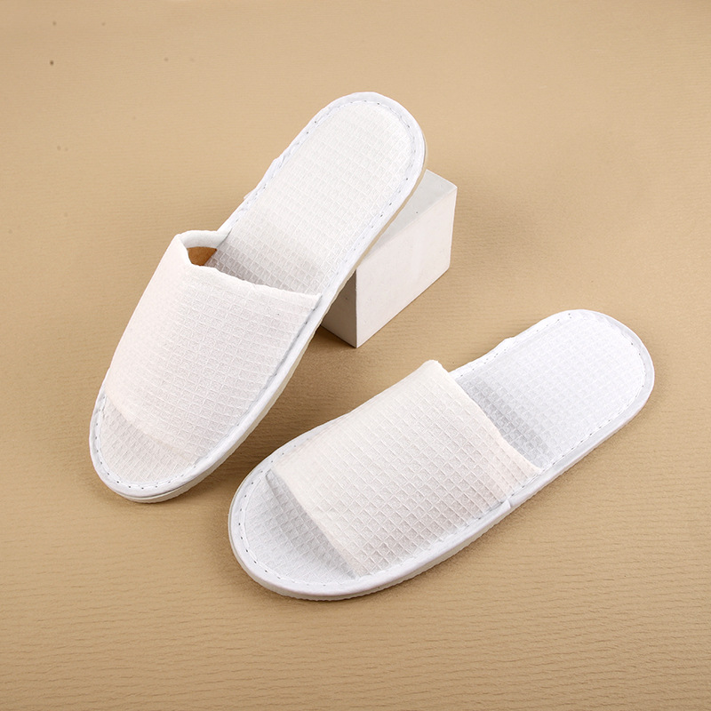 Picture of Hotel and homestay disposable waffle slippers home hospitality travel thickened slippers can be wholesale ordered LOGO