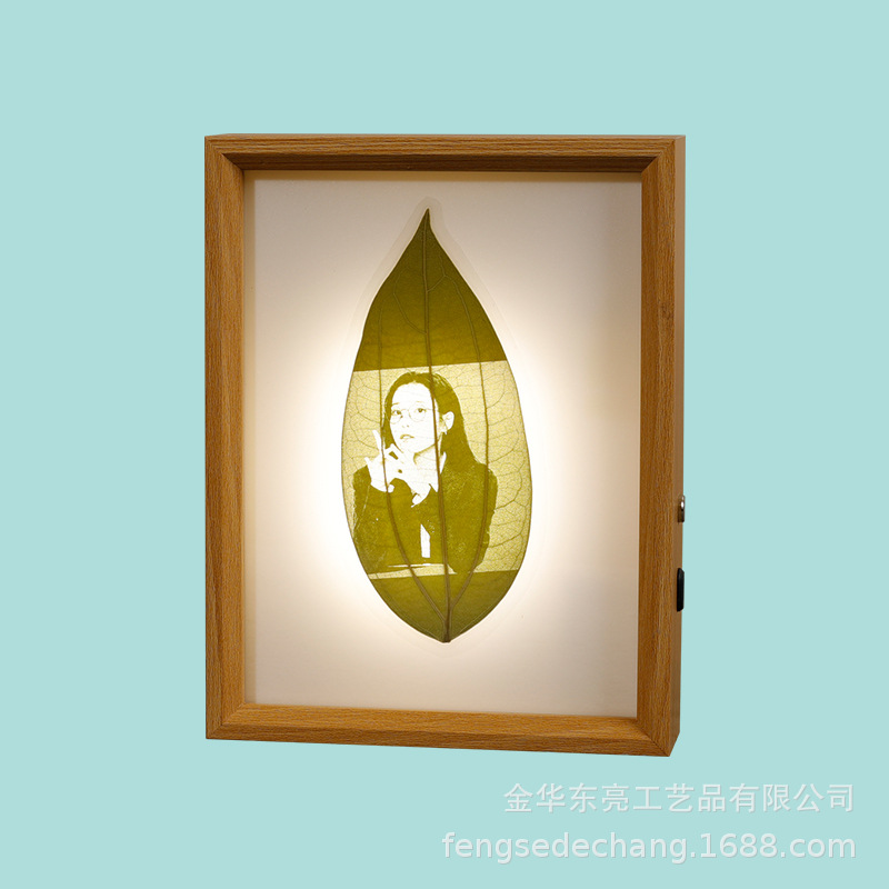 Picture of Leaf carving touch switch creative luminous photo frame table manufacturers wholesale clip picture frame paper-cut night light table