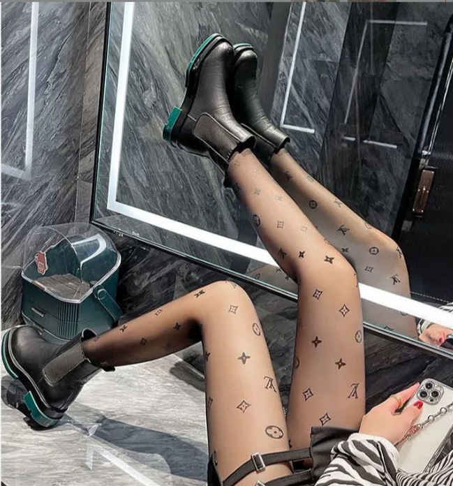 Picture of TikTok Explosions Black Silk Stockings Women's Sexy Slimming Side Vertical Stripe Black Stitching Pantyhose Instagram Style Trendy Stockings